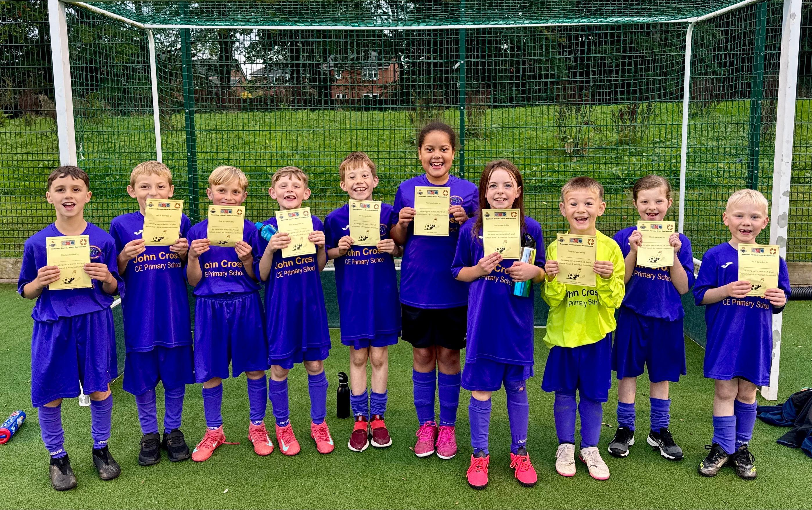 Y3/4 mixed football team competition joint winners.